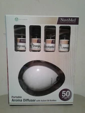 New one NUVOMED PORTABLE AROMA DIFFUSER W/ 4 X 5ml OIL BOTTLES included 