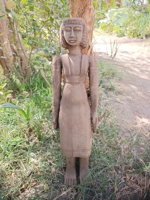 Ancient egyptian antique tall wooden female sculpture with carved hair and dress