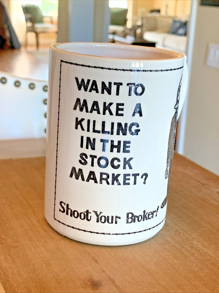 A vintage mug roasting Wall Street stock market types with dark humor — the kind of office desk piece that says everything without saying a word.