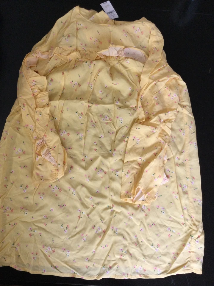 Vestido viscosa manga larga niña flores amarillo hueco $44.95 Foto 2 de 4