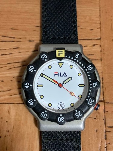 FILA Quartz Watch White Dial Date Rotating Bezel Mens Used