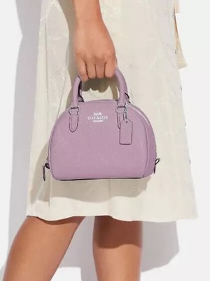 coach♡ショルダーバッグ♡ピンク♡ラベンダー♡パープル A love note in bag form! COACH blends romantic details with