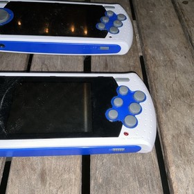 Set Of 2- SEGA Genesis Ultimate Portable Game Player - White & Blue