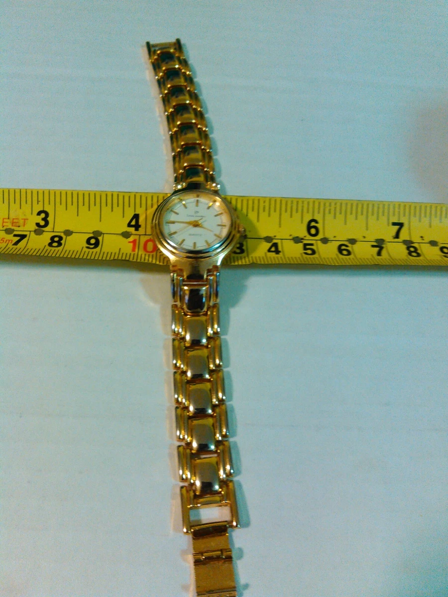 Montre Estate Louis Jourdan ton or cadran blanc neuve fonctionne sur batterie