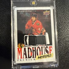 2025-26  BLACKHAWKS CENTENNIAL PREMIUM MADHOUSE MATERIALS NIKLAS HJALMARSSON /25