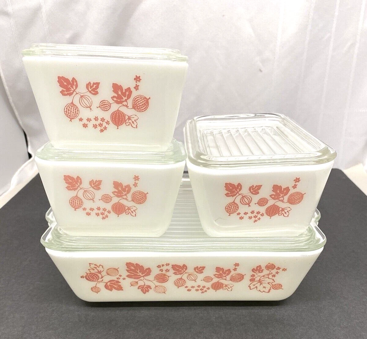Pink pyrex top refrigerator dishes