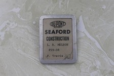VINTAGE & ORIGINAL BADGE FROM DUPONT SEAFORD CONSTRUCTION CO