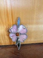 stained glass suncatcher in the shape of a four-leaf clover