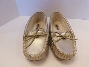 gold moccasin slippers