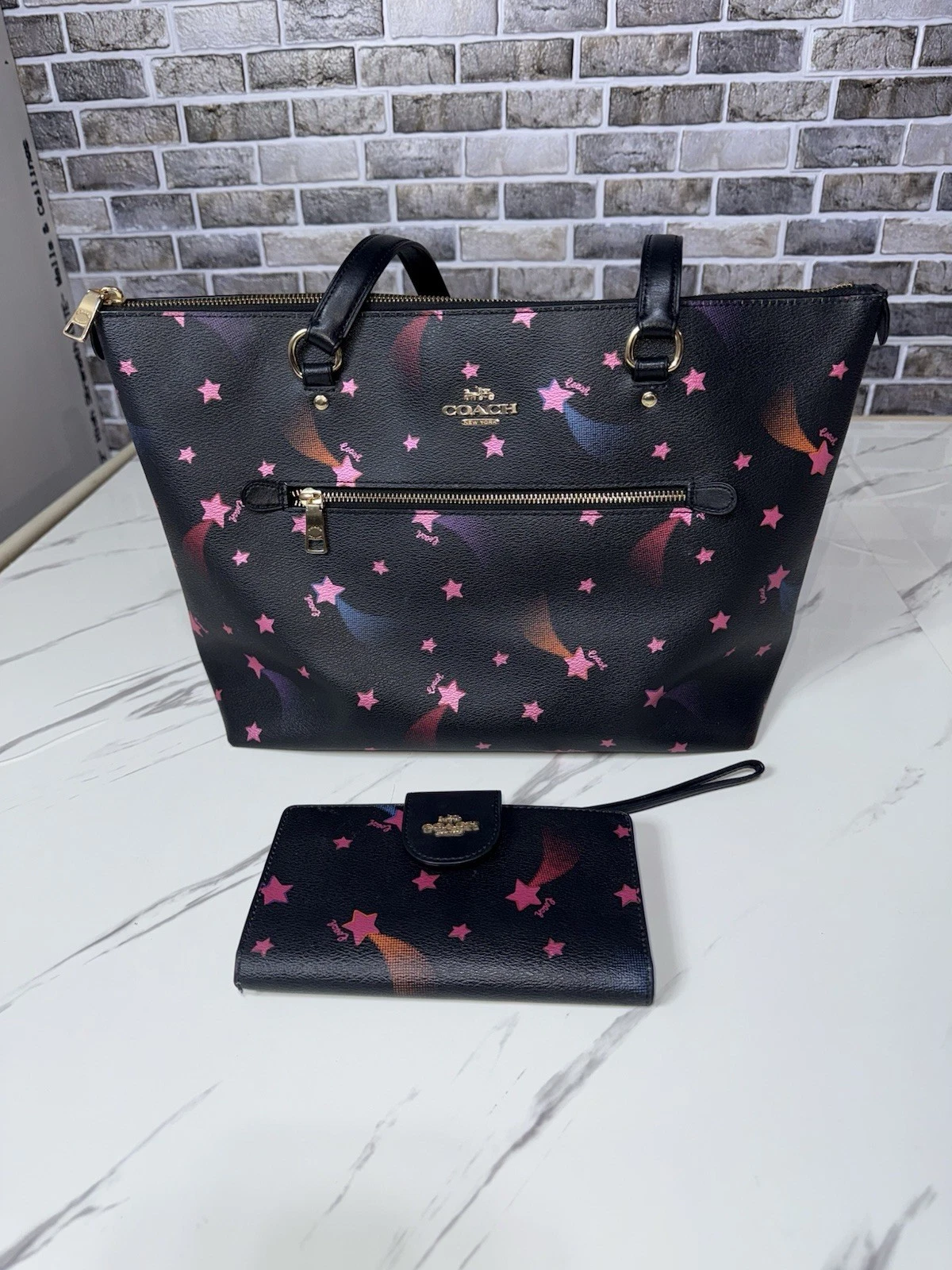 Borsa Coach Gallery con stampa stella discoteca con portafoglio abbinato