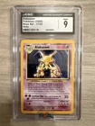 1999 Pokemon Alakazam CGC 9 Mint Holo #1 Base Set