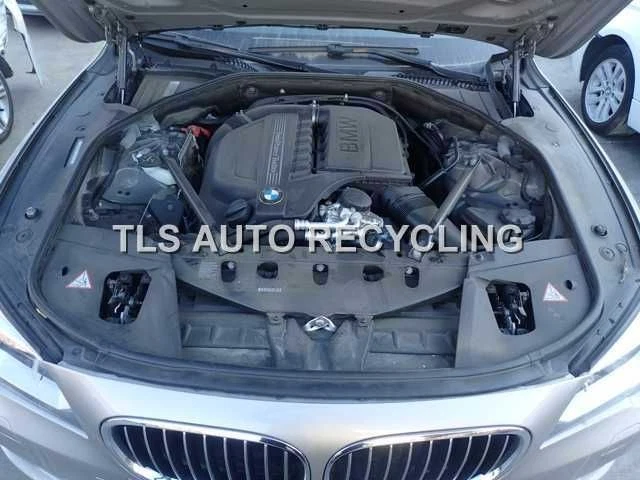 Actuador bloqueo delantero izquierdo bmw 740il 2013 Foto 3 de 4