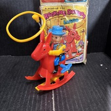 Rockin cowboy with Lasso, a wind up toy made in Hong Kong Box Vintage Rare Tin