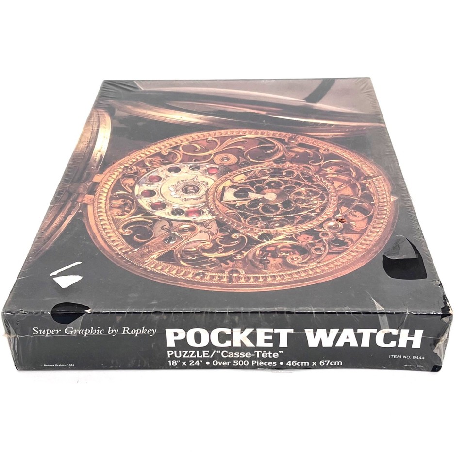 A still-sealed 1981 500-piece pocket-watch illustrated jigsaw — time-capsule nostalgia with gorgeous vintage graphic design on the box.