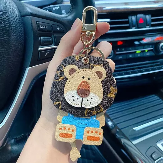 Louis Vuitton leather cute lion keychain