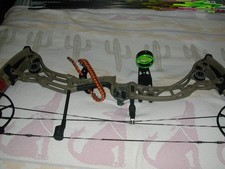 1 Bowtech CP28 Compound Bow With A Lot of Extras. As A packedage.