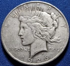 A 1926-D Peace Dollar 90% Silver $1 Dollar.  Nice Mid Grade
