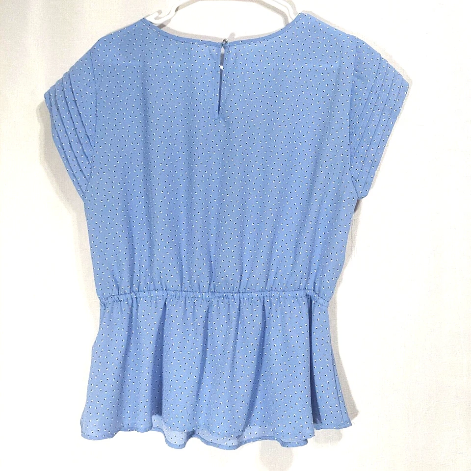 Blusa grande plisada blanca lirio para mujer mangas cortas dobladillo peplum cintura elástica Foto 4 de 4