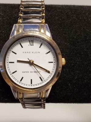 Anne Klein Women's Silvertone Stretch Band Water Resistant Watch