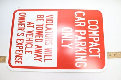 Compact Car Parking Only Violators Will Be Towed Away At Vehicle Owner's Expense