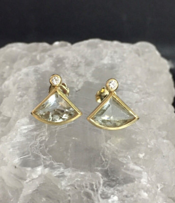 Ausgefallener Ohrschmuck in 585er Gelbgold besetzt mit Edelsteinen