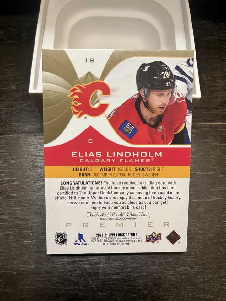 2020-21 UD PREMIER PATCH BASE PARALLEL 2/25 ELIAS LINDHOLM #18 CALGARY FLAMES - Image 2 of 2