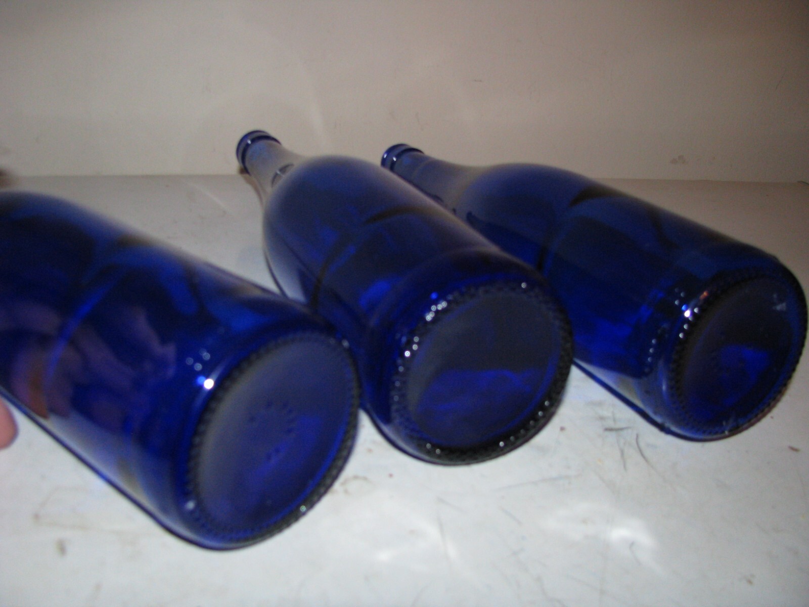 SET OF 3 BLUE GLASS BOTTLES- EMPTIED & CLEANED 750ml NO CORK
