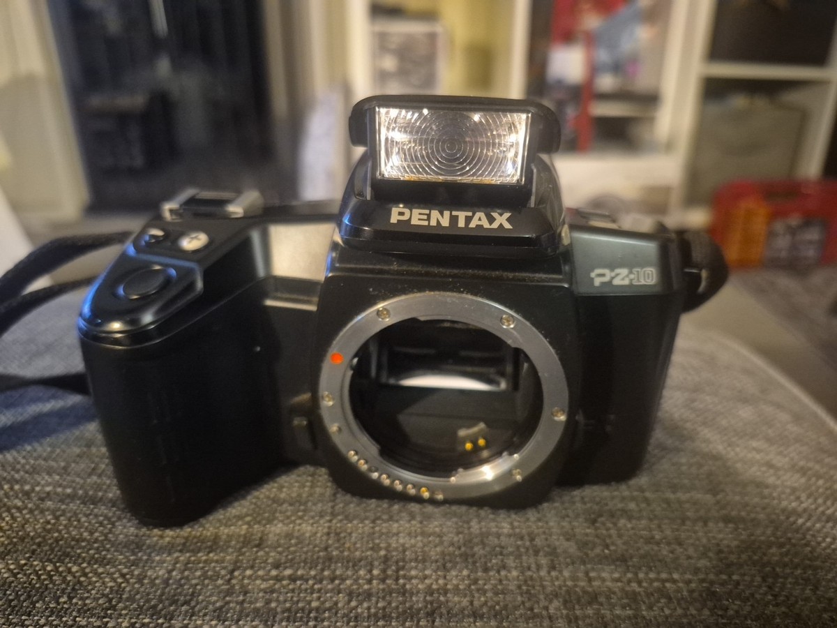 Pentax PZ10 35mm SLR film Camera w/ Strap + lense + old