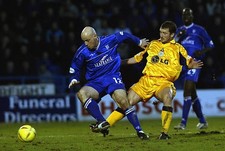 Paul Shaw of Gillingham is tackled by Billy McKinlay of Leicester - Old Photo