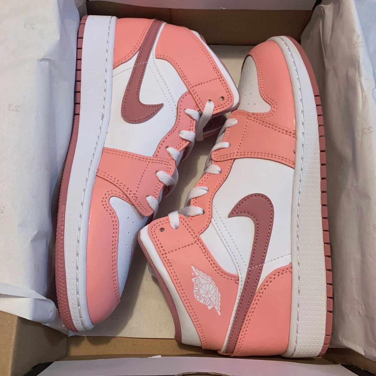 Coral pink jordan clearance 1