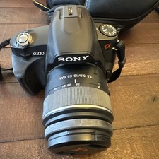 Sony Alpha A230 Digital SLR Camera with 18-55 Lens flash & Accessories