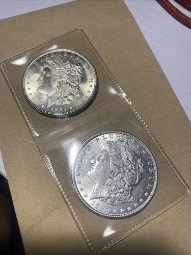 Lot Of (2) Morgan Silver Dollars- 1887p & 1921p- BU