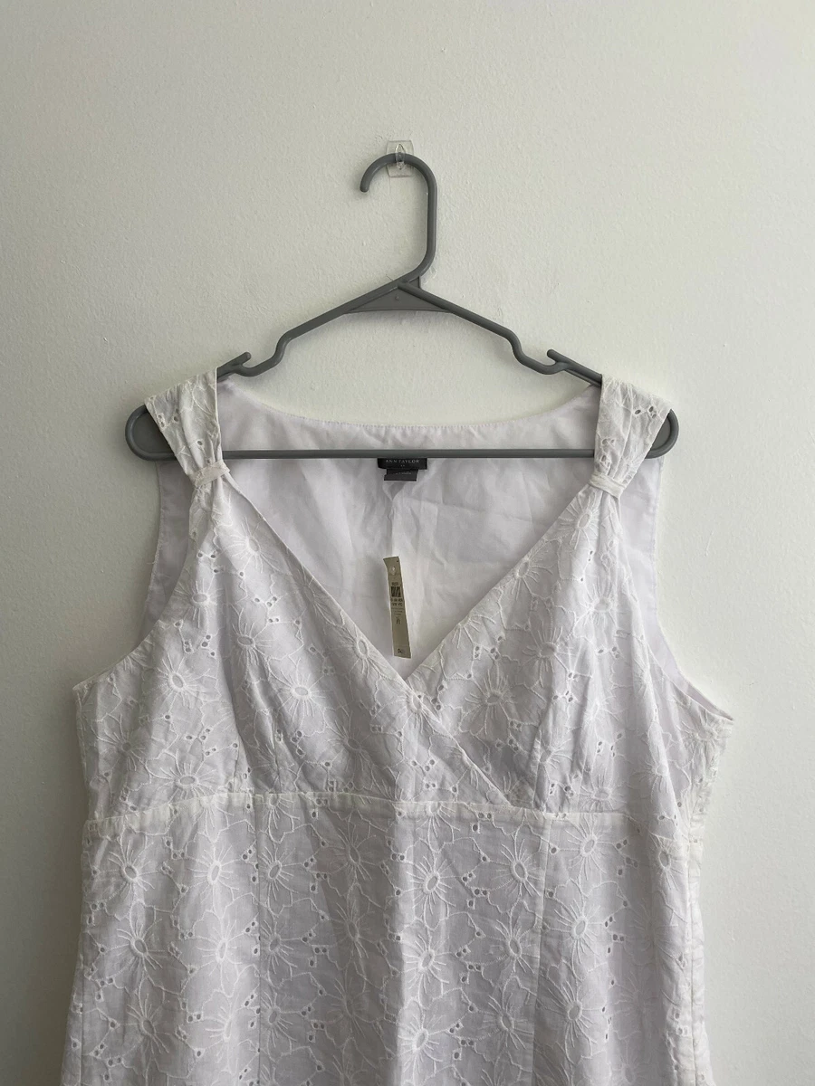 White eyelet top sleeveless top