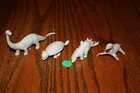 Lot of Four Vintage MPC Gray Dinosaurs - with Brontosaurus & Kronosaurus - Marx