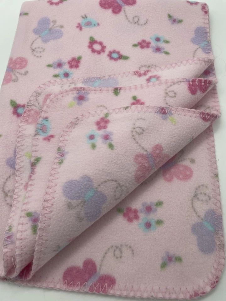Manta bebé niña mariposa floral polar borde cosido de colección Garanimals rosa Foto 3 de 4