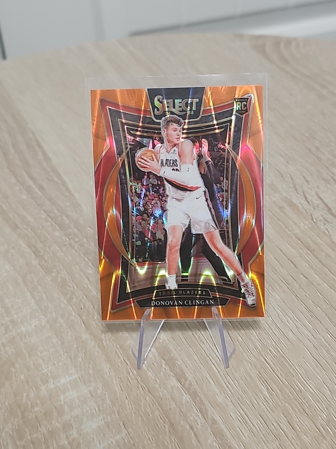 2024-25 Panini Select - Concourse Donovan Clingan #69 Orange Tectonic Prizm (RC)