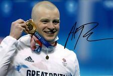 Adam Peaty Signed 12X8 Photo Tokyo 2020 Genuine Signature AFTAL COA (U) Adam Peaty Signed 12X8 Photo Tokyo 2020 Genuine Signature AFTAL COA (U)