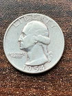 1954 p washington quarter a extra fine coin . pluse a surprise