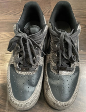 Nike Air Force 1 Para hombres Zapatillas bajas con cordones Negras/Grises Piel de serpiente