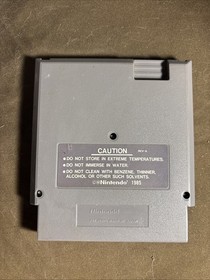 Nintendo NES Gray Video Game Console With Controller, Cords, And Mario Bros. 3