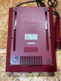 Nintendo Famicom (FC) console, model number H1555532, includes software, service