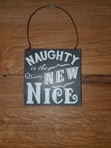 Naughty Is The New Nice Christmas Door Hanger