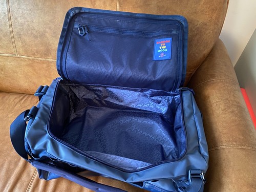 Baboon to the Moon Blue Vinyl Go Bag Backpack Compact Bag 40L