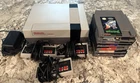 Vintage Nintendo Entertainment System With Accessories And Video Games Lot