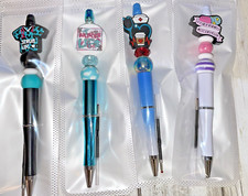 4 miscellaneous beaded pens with 1  ink refill each