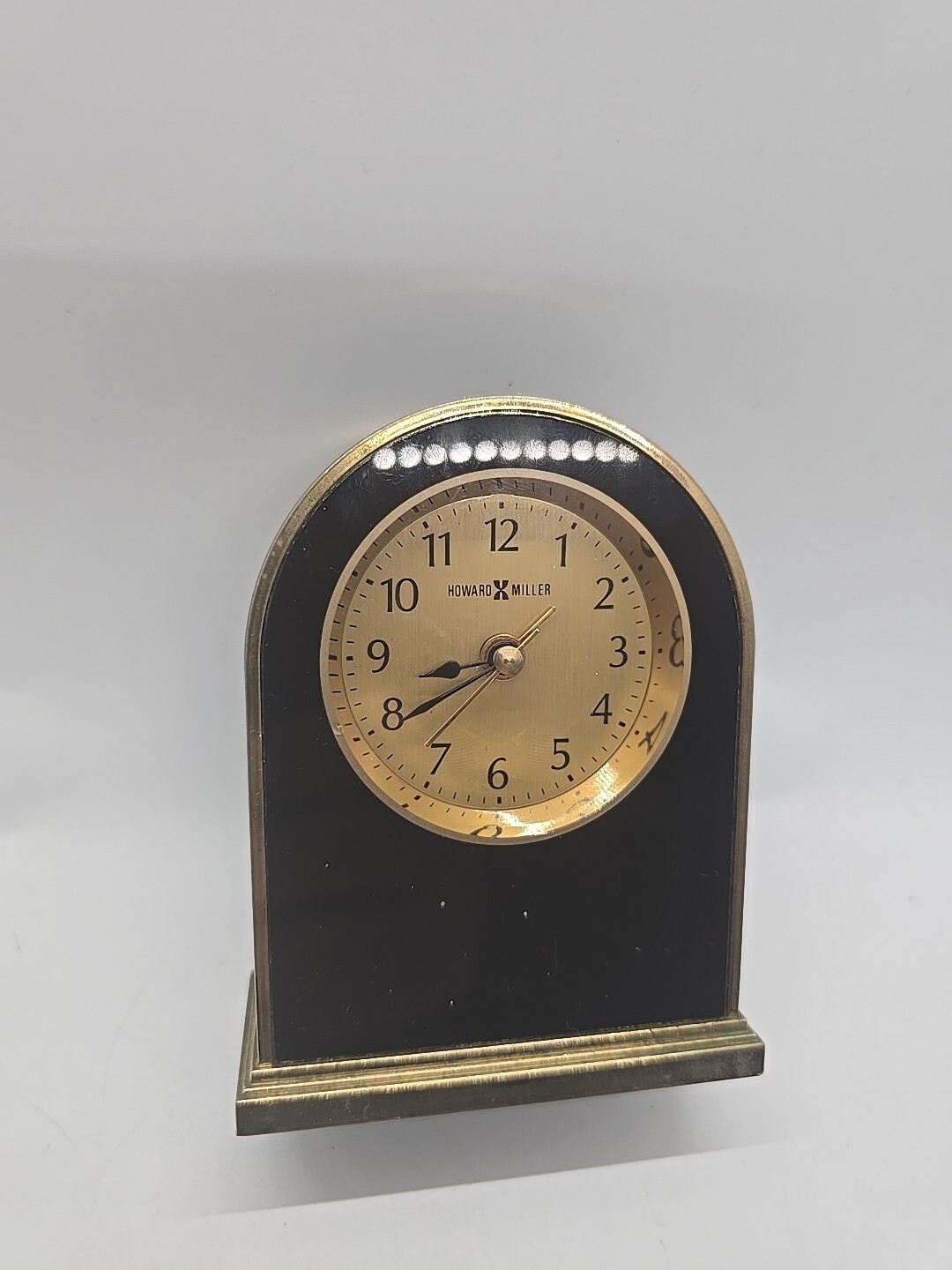 Classic HOWARD MILLER Table Alarm Clock BLACK & BRASS Working featured image