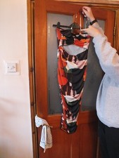 Ladies autumn colours halter neck dress by PRETTYLITTLETHING. Size 8