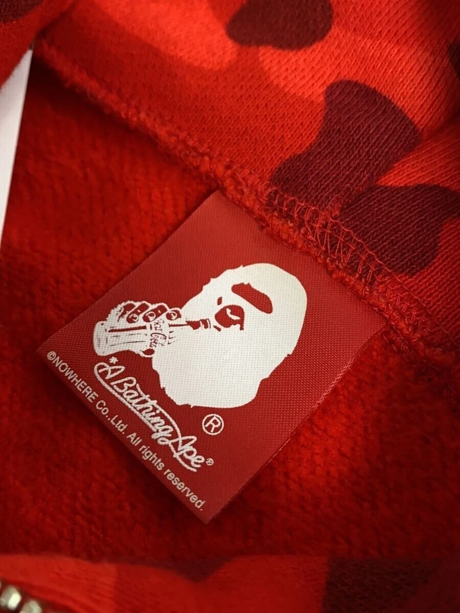 A BATHING APE (BAPE) Felpa con cappuccio zip A BATHING APE × Coca・Cola rossa L usata