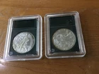 Lot of 2..one 1986 & one 1987 .American Silver Eagles Unc. in Protectors