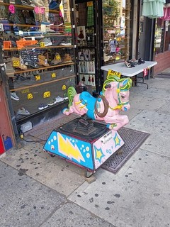 A Money $ making coin operated kiddie ride in Brooklyn NY